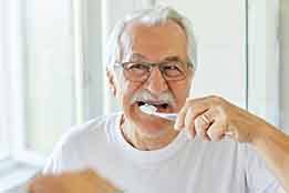 Excellent oral hygiene is an important way to protect your dental implants