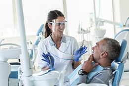 Dentist explaining treatment to patient